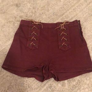 Mid-rise shorts with faux suede tie accent